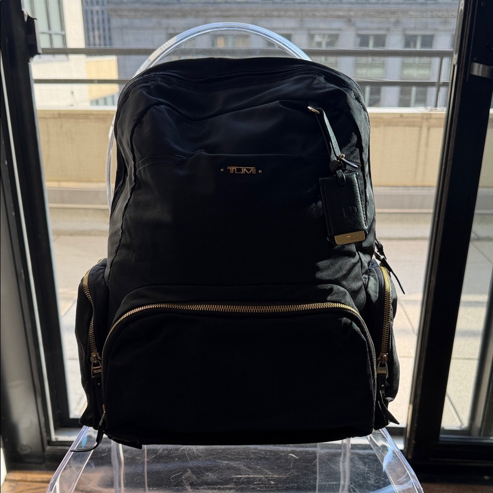 Tumi Black Backpack with Gold Accents